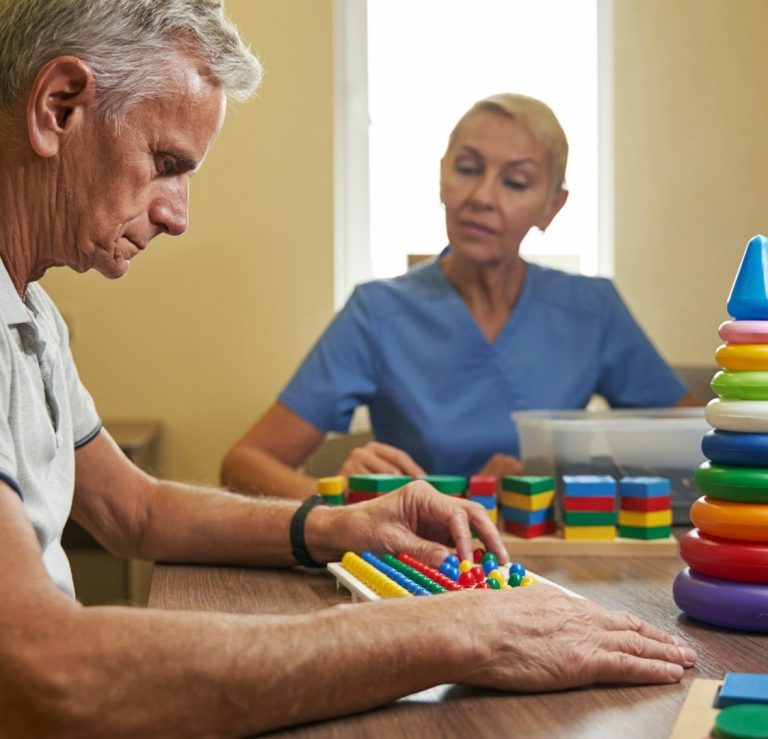 Elderly man playing An elderly man plays a game